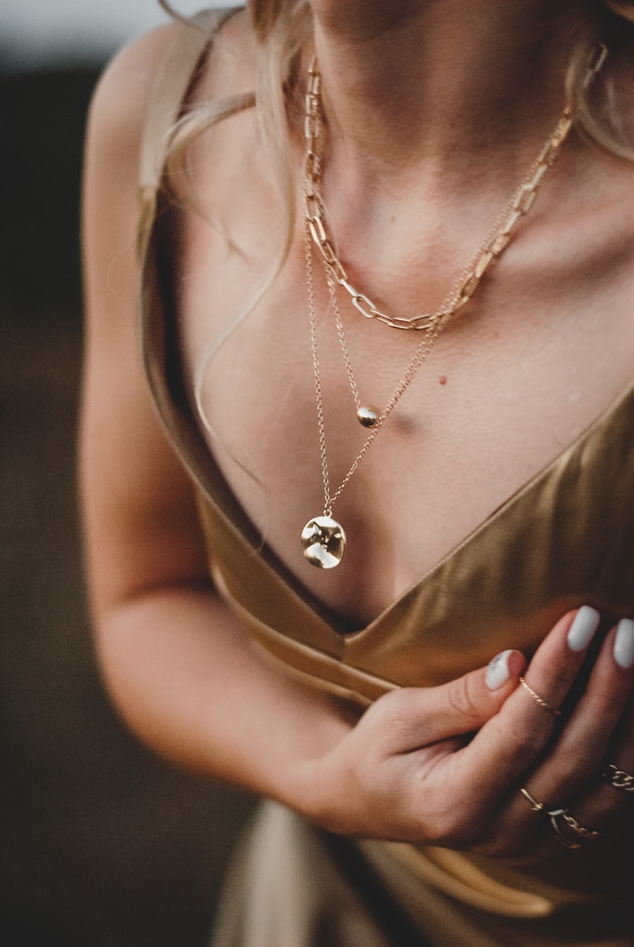 Layered gold necklaces